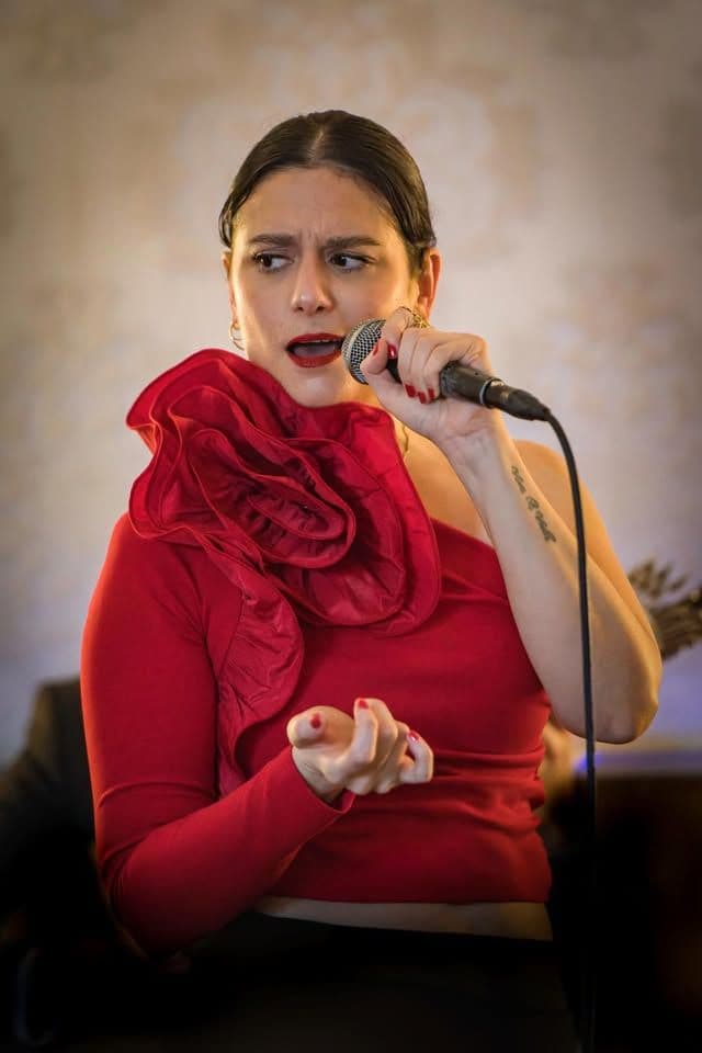 "Silence, for the Fado is about to be sung!"
