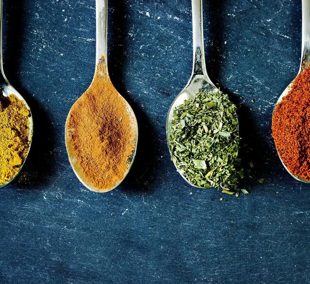 spoons with different spices