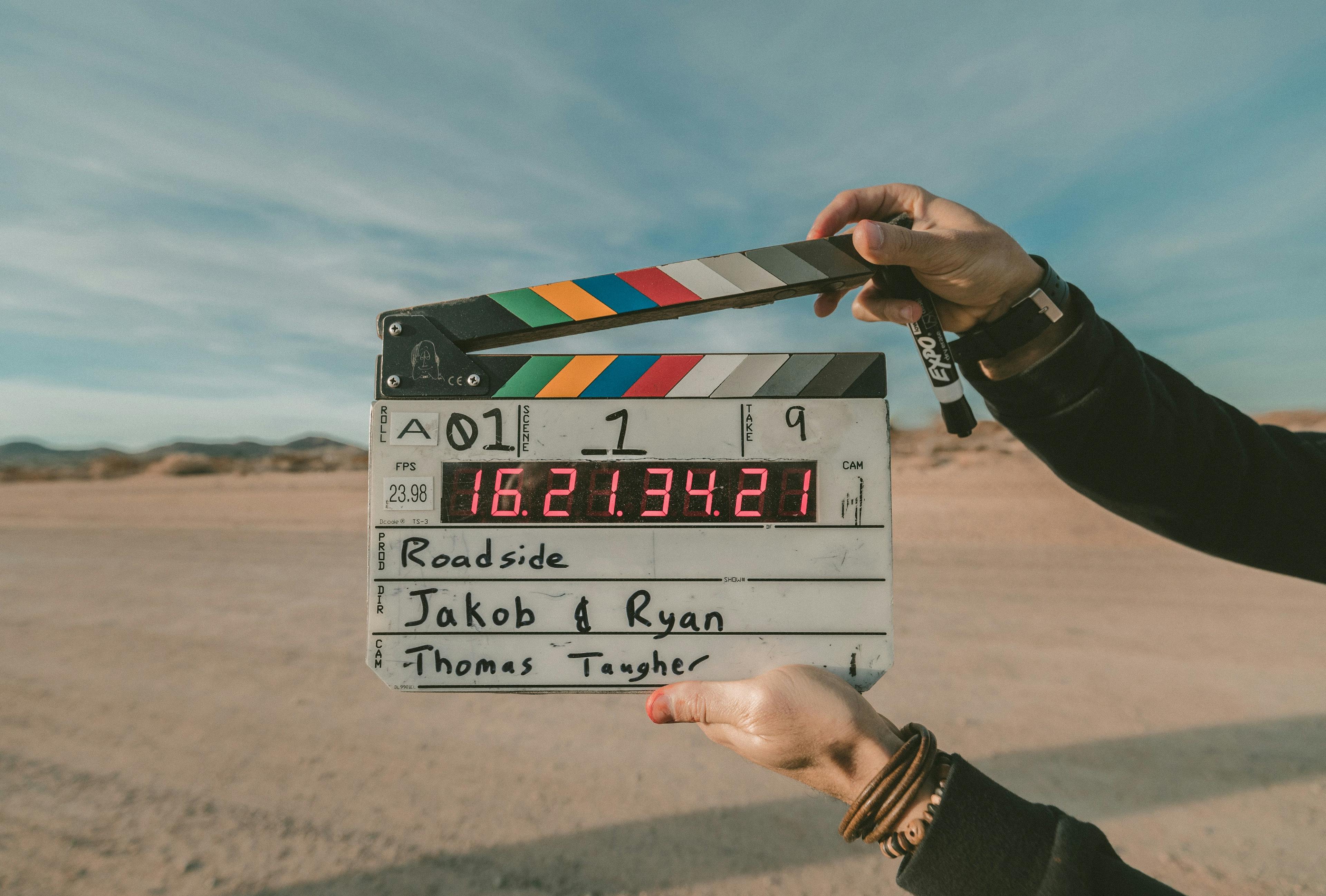 filming a movie in the desert, hands