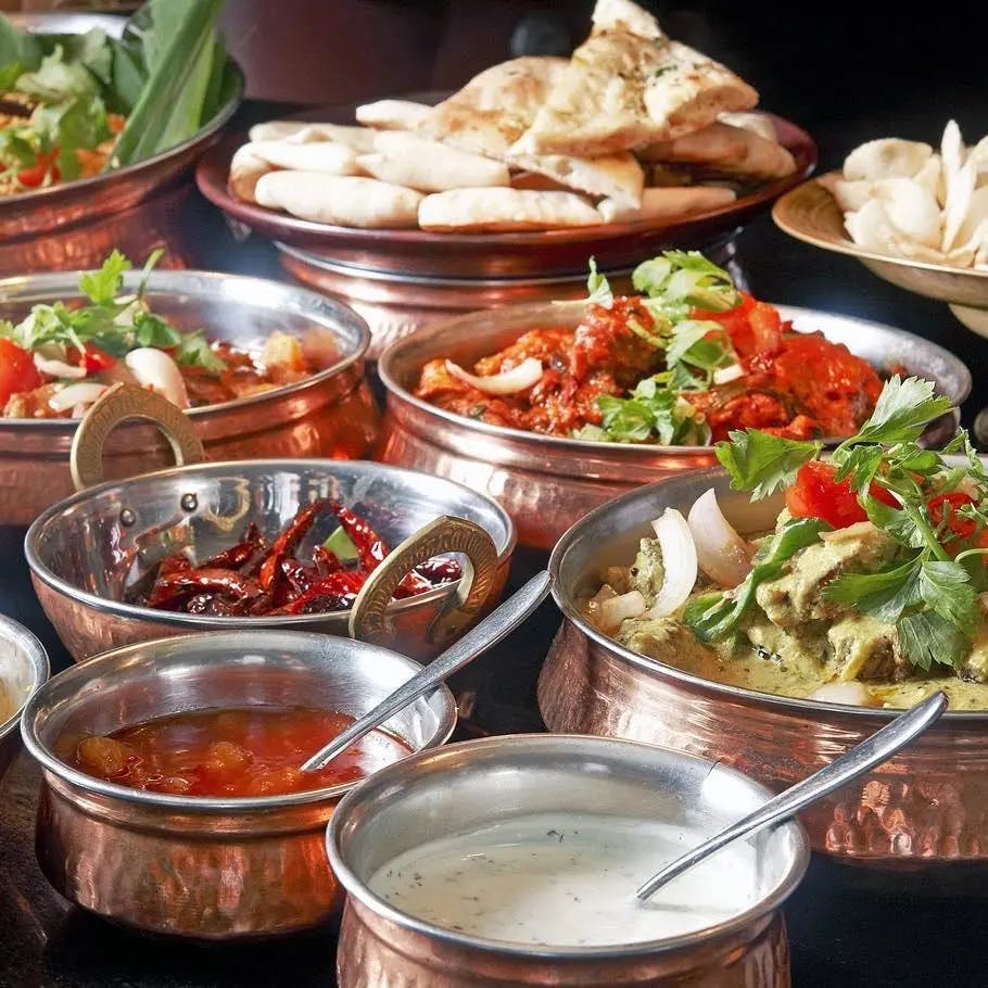 bowl of numerous indian dishes